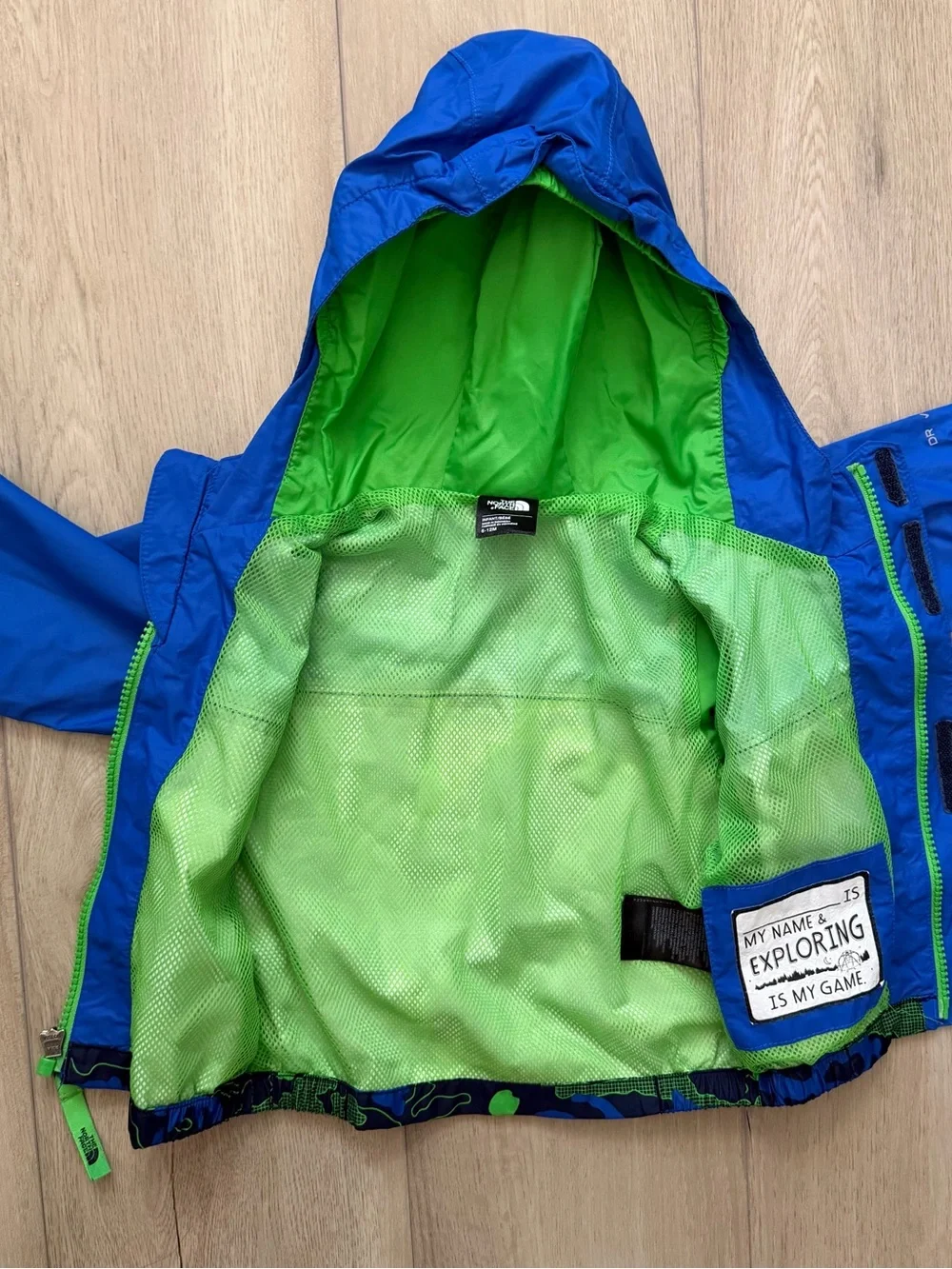 The North Face Royal Blue Hooded Jacket with Green Camo Panels